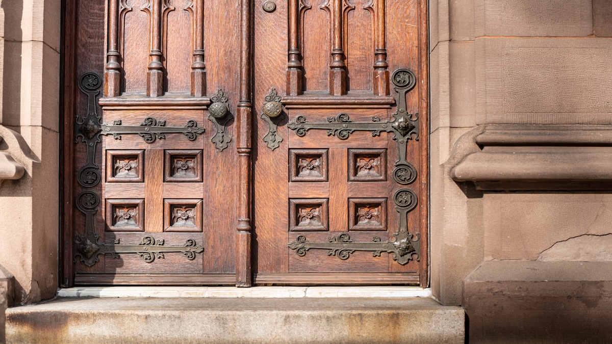 old-wooden-exterior-doors-with-decorative-panels-2025-10-17-01-44-30-utc