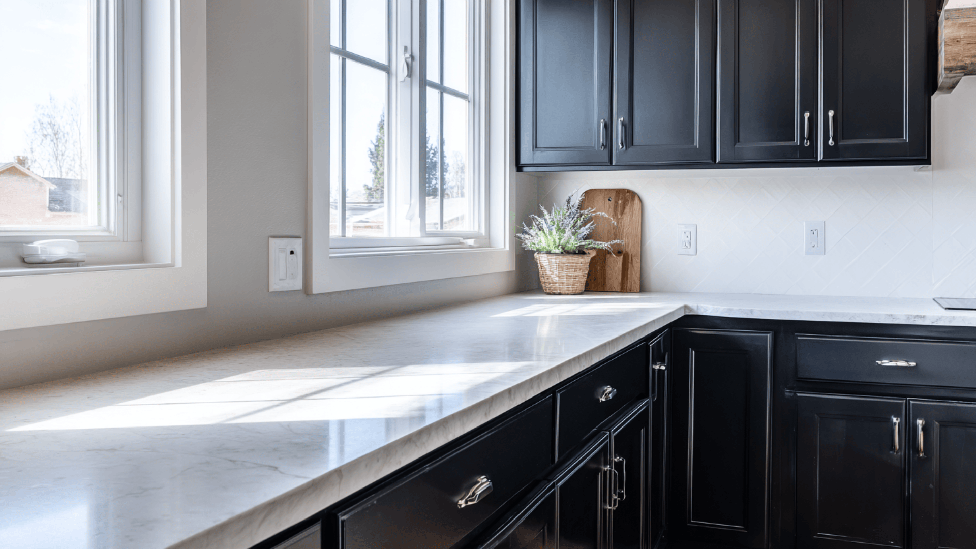 black cabinets used sparingly in a small farmhouse kitchen