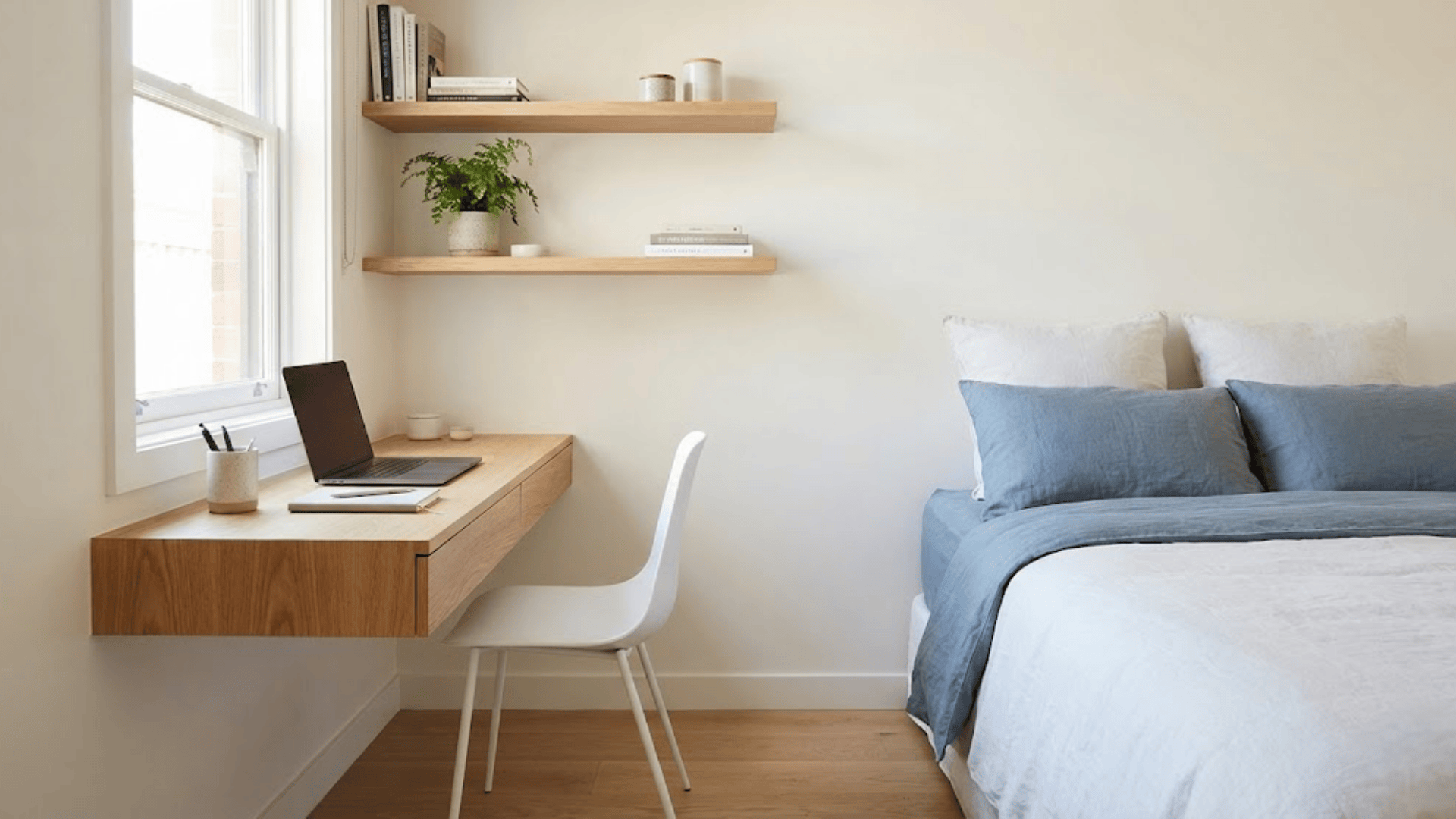 floating desk and wall mounted storage layout