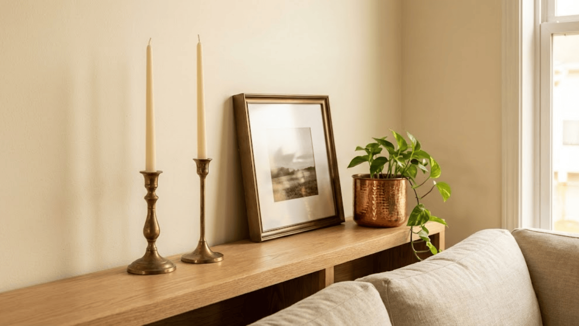 warm metallic accents in brass or bronze