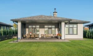 Modern home with covered patio space.