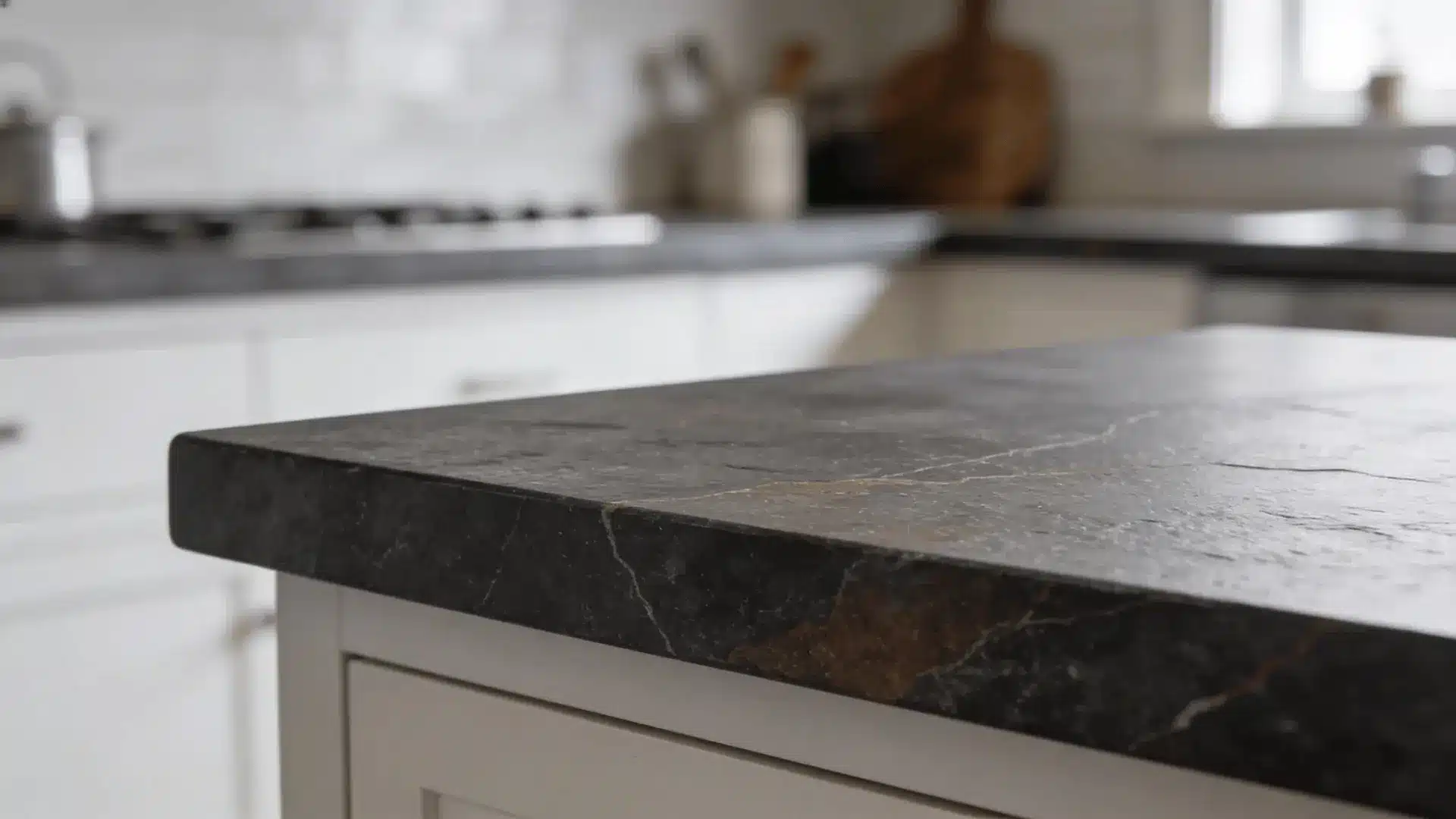 Dark matte soapstone countertop with subtle surface variation