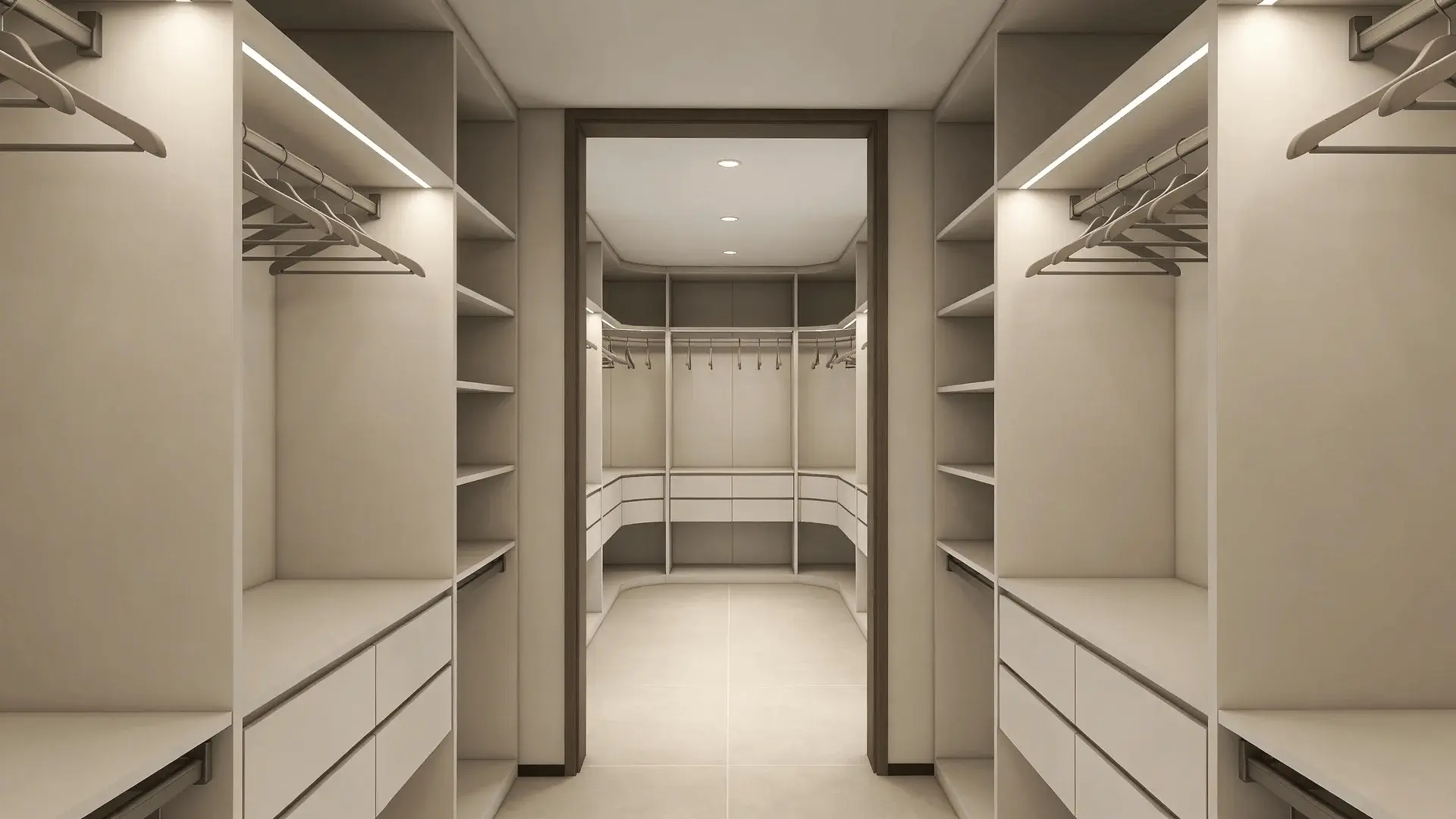 U-shaped walk-in closet with hanging on three walls and open center aisle