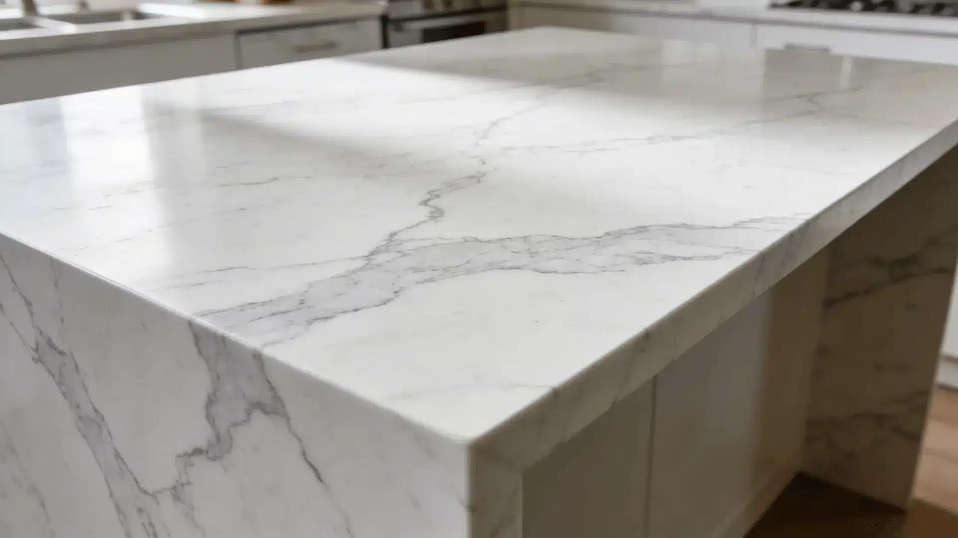 White marble countertop with gray veining in a kitchen setting