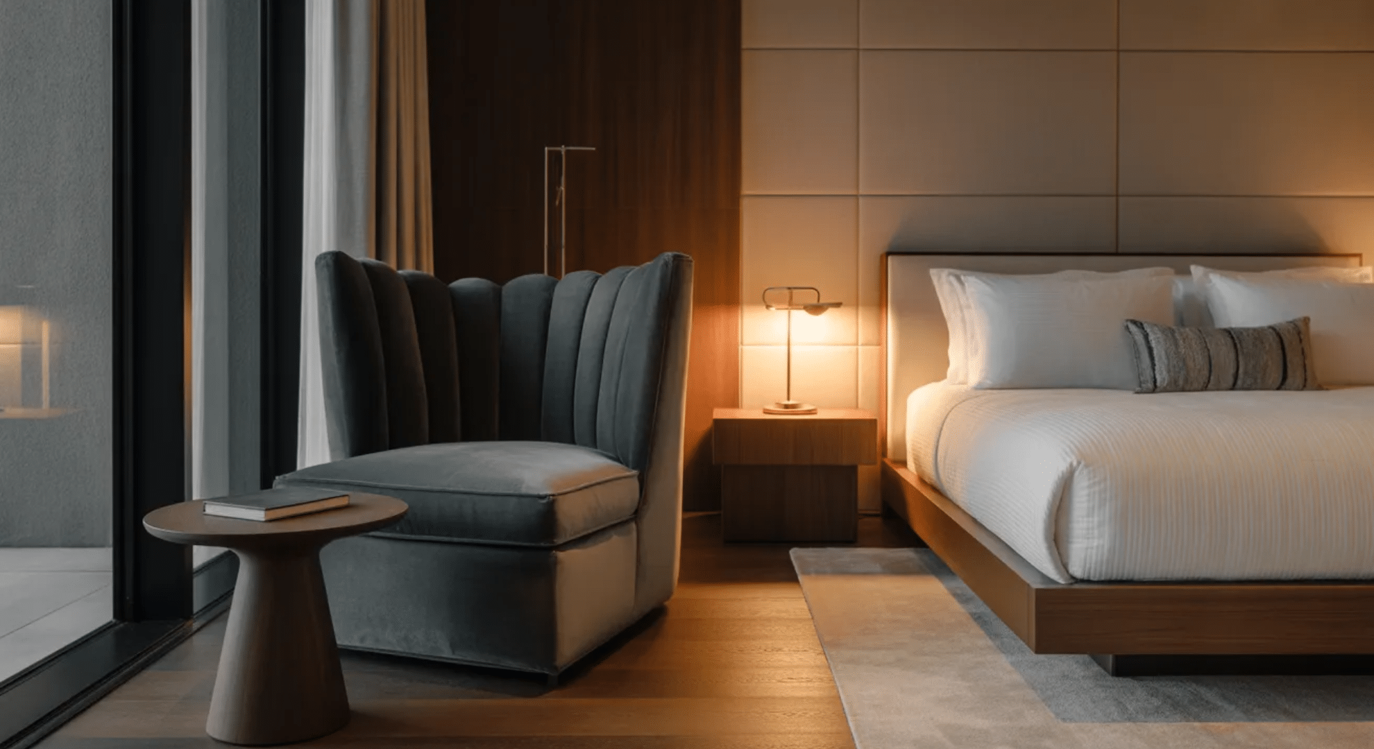 luxury bedroom suite with lounge area