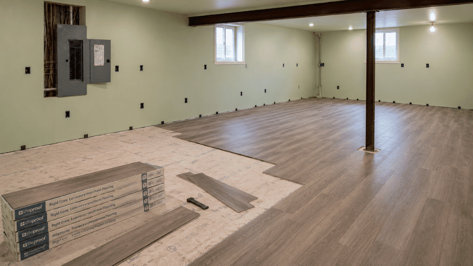 diy basement finishing flooring installation with vinyl plank over basement subfloor