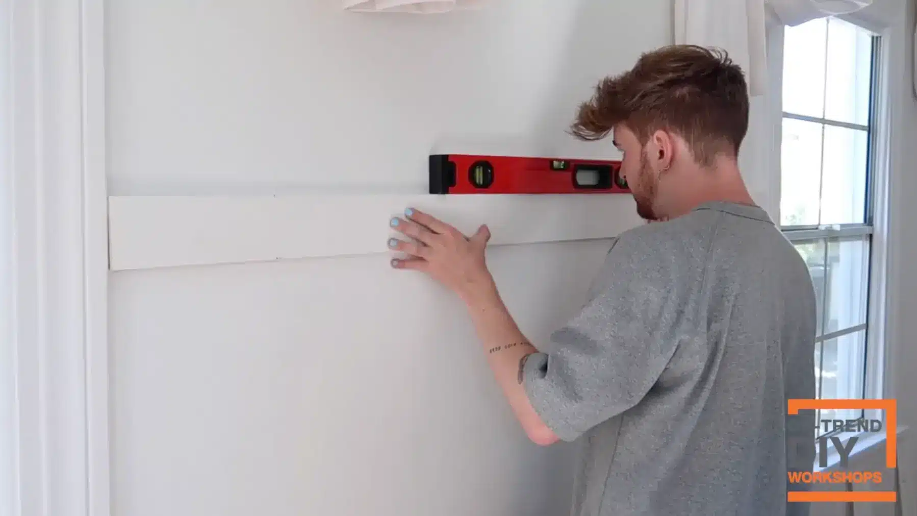 leveling top rail on diy board and batten wall