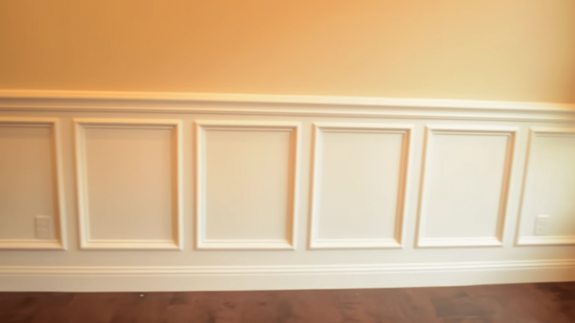 priming filling sanding caulking and painting the recessed wainscoting so the trim looks smooth and clean