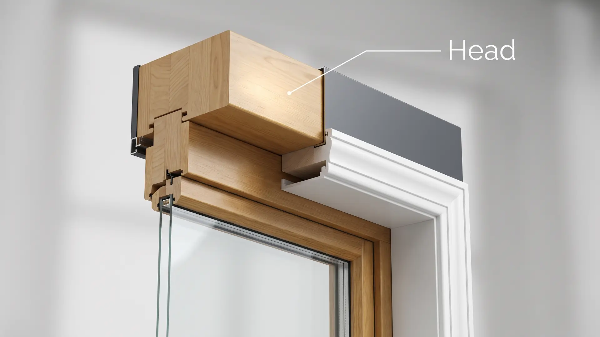 close view of a window head showing the upper wood frame glass edge and surrounding white trim