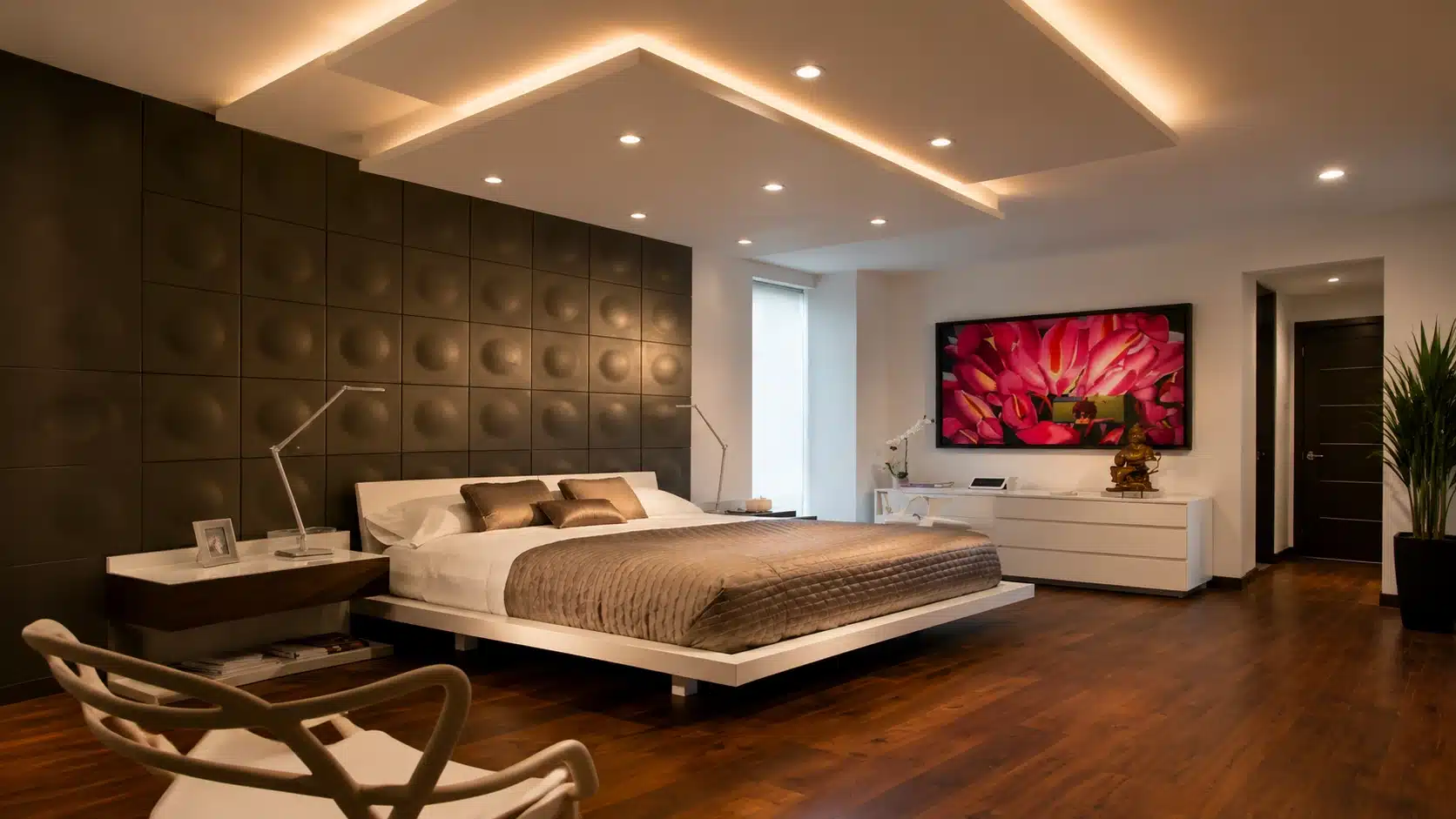 modern bedroom with double level ceiling design and recessed lighting above a platform bed