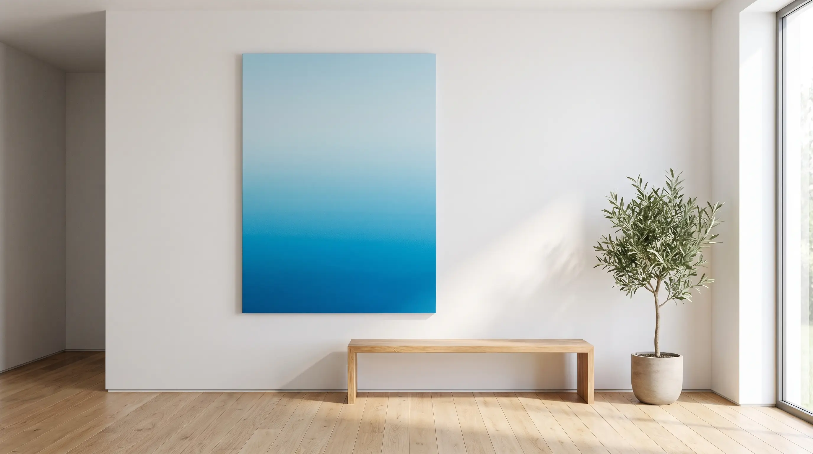 a blank canvas painted in a smooth ombre gradient that blends a light shade slowly into a dark one