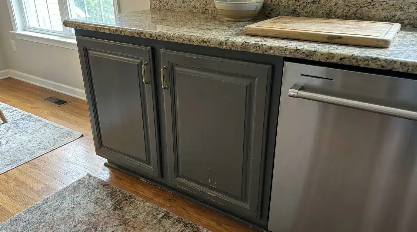 base cabinets beneath a thick countertop showing cabinet height drawers doors and toe kick